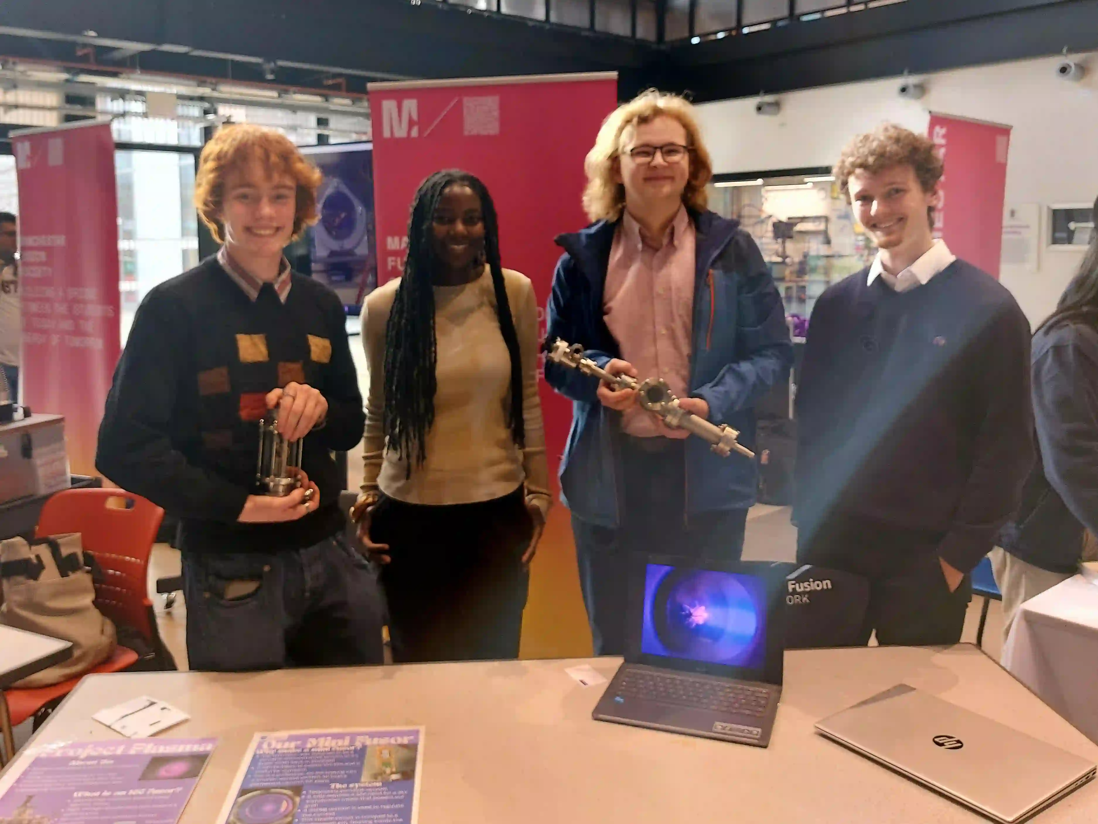 Image of Project Plasma at the Formula Fusion event, presenting our mini fusor, and a sneak peak at a new concept for another type of mini fusor. Project Plasma showcase